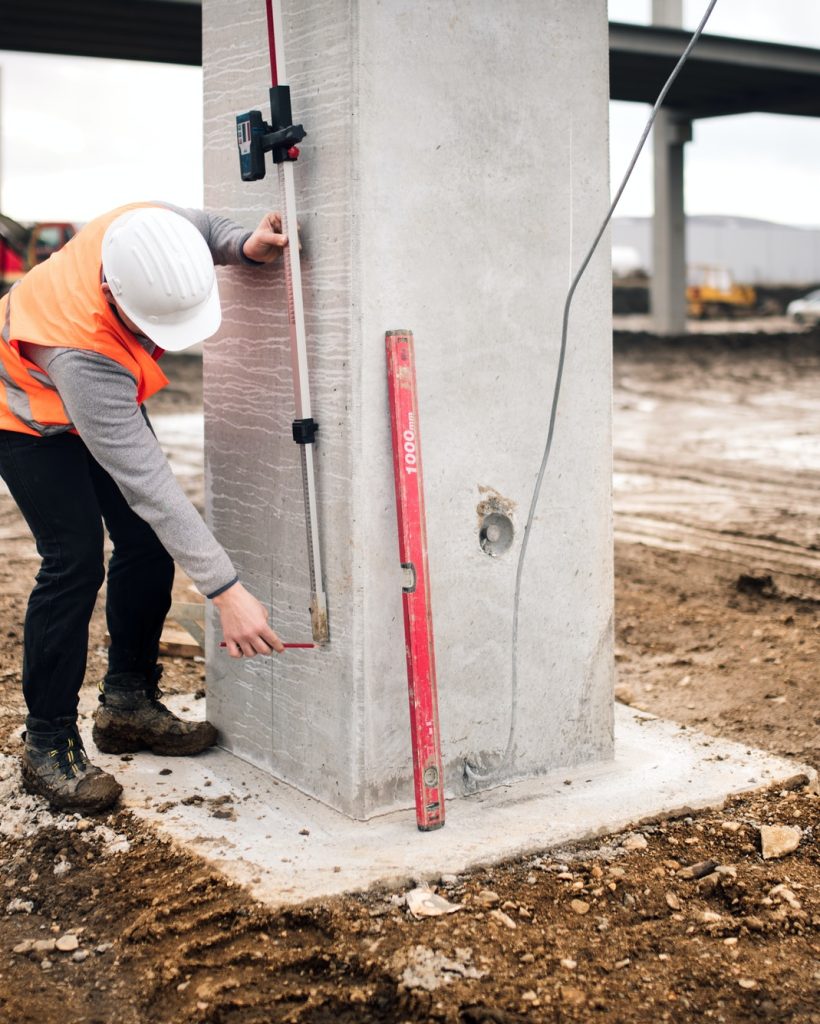 close-up-details-of-working-surveying-engineer-on-surveyor-work-at-construction-site.jpg